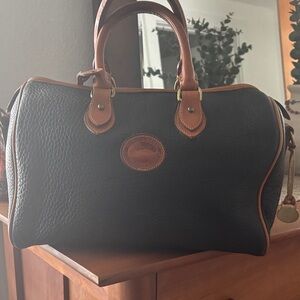 Vintage Dooney & Burke Satchel in Pebbles black leather, tan trim.